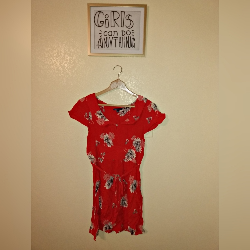 Red dress with flowers.